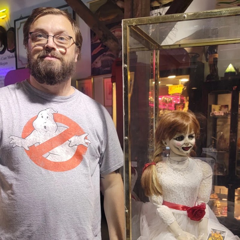 Sgt_Shells next to an Annabelle doll